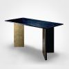 Scorcio - Nero Marquinia marble and gold leaf Dining table | Tables by DFdesignLab - Nicola Di Froscia. Item composed of metal and marble in contemporary style
