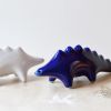 DINOS - Salt + Pepper | Holder in Tableware by Maia Ming Designs. Item composed of ceramic