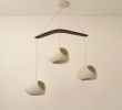 Claylight Double Cut Boomerang | Chandeliers by lightexture. Item made of wood with ceramic