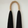 Jute Arch with Black Fringe | Wall Sculpture in Wall Hangings by YASHI DESIGNS | La Sierra Autos in Dallas. Item composed of cotton in minimalism or contemporary style