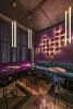Decorative wall in a bar “Le Kiki” | Lighting by Pleiades lighting