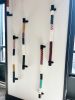 Vertical Painted Ropes | Wall Sculpture in Wall Hangings by Cassandra Smith | Momentum Midtown in Atlanta. Item composed of cotton and metal in contemporary or coastal style