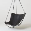 Modern Butterfly Swing Lounge Chair in Black | Swing Chair in Chairs by Studio Stirling. Item made of steel with leather works with boho & minimalism style