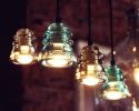 Insulator Light Pendant Chandelier | Chandeliers by RailroadWare Lighting Hardware & Gifts | KEEN Garage in Portland. Item made of glass