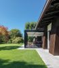 Villa Alce | Architecture by Federico Delrosso Architects. Item composed of wood and stone