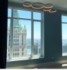 Super 8 Pendant Lights | Pendants by Le Deun Luminaires | Woolworth Tower Residences in New York. Item composed of brass