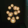 Golden Bell Flower Chandelier | Chandeliers by PATAPiAN. Item composed of bamboo & brass