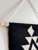 Wall Hanging – Black & Ivory Geometric Tapestry | Wall Hangings by Mumo Toronto. Item composed of cotton compatible with boho and contemporary style