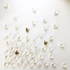 55 Original White Porcelain + Gold Ceramic Butterflies | Wall Sculpture in Wall Hangings by Elizabeth Prince Ceramics. Item made of stoneware works with minimalism & japandi style