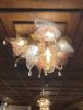 Flowers Collection | Chandeliers by F+M FOS - Anna Maria Fragiskos Bitros | Αρχοντικο Δεληγιαννη Hotel in Dimitsana. Item made of metal & glass compatible with modern style