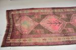 Pink, Purple, Charcoal Black Nomadic Vintage Rug | Runner Rug in Rugs by The Loom House. Item composed of fabric & fiber