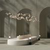 Dune 20 Curve in Metallic Tones Pendant Light | Chandeliers by MOSS Objects. Item composed of metal in contemporary or japandi style