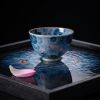 Heritage Wood-fired Porcelain Tea/Coffee Bowl Fish at Play | Decorative Bowl in Decorative Objects by Dynasty Artisan. Item composed of ceramic compatible with eclectic & maximalism and asian style