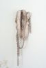 "Afra" Ceramic wall sculpture with chains | Wall Hangings by Asmaa Aman Studio. Item made of ceramic works with boho & contemporary style