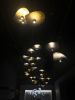 Nymphaea Installation | Lighting Design by Claudine Gevry Studio | Salari Fine Carpets in Vancouver. Item made of aluminum