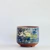 Handmade and Hand-Painted Blue, White and Yellow Tea Cups | Drinkware by cursive m ceramics. Item composed of stoneware