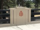 Discovery West Neighborhood inlaid bridge logos | Architecture by Rochelle Rose Schueler - Wild Rose Artworks LLC