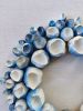 White and blue wall/bookshelf sculpture, framed | Mixed Media by Natasha Kanevski. Item compatible with minimalism and contemporary style