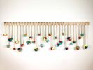Hand-painted Monkey's Fist Knots | Wall Sculpture in Wall Hangings by Cassandra Smith | Aloft Seattle Redmond in Redmond. Item made of wood with cotton works with contemporary & coastal style