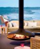 Gyrofocus Fireplace | Fireplaces by European Home | Southern Ocean Lodge in Kingscote. Item composed of metal