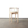 Lloyd Barstool by Crump and Kwash | Bar Stool in Chairs by Crump & Kwash | Austin Proper Hotel in Austin. Item composed of wood and fabric