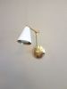Kitchen Shelves Adjustable Wall Light - Industrial Sconce | Sconces by Retro Steam Works. Item composed of brass in mid century modern or industrial style