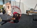 Studio Stirling - Lucky Bean at Design Joburg 2022 | Swing Chair in Chairs by Studio Stirling | Sandton Convention Centre in Sandton. Item made of steel & leather compatible with minimalism and modern style