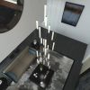 Rainfall Foyer Chandelier with 25 Frosted White Glass | Pendants by Galilee Lighting. Item made of metal with glass works with minimalism & modern style