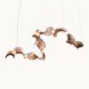 Dune 10 Curve in Metallic Tones Pendant Light | Chandeliers by MOSS Objects. Item made of metal works with contemporary & japandi style
