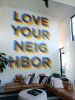 Love Your Neighbor | Murals by Graham Edwards Art | Brick Avenue Lofts in Bentonville