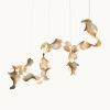 Dune 16 Spiral in Metallic Tones Pendant Light | Chandeliers by MOSS Objects. Item made of metal works with contemporary & japandi style