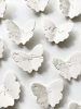 Set of 25 Botanical Butterflies wall sculpture artwork | Wall Hangings by Elizabeth Prince Ceramics. Item composed of ceramic in minimalism or mid century modern style