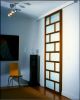 Interlocking Sliding Doors | Furniture by Brian Cullen Furniture. Item made of walnut with glass works with modern style