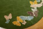 Spirit in the Sky rug. Butterflies on green background | Small Rug in Rugs by Sergio Mannino Studio. Item composed of fabric