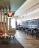 Edith Chairs | Dining Chair in Chairs by TrabÀ | Restaurant 37 in Bozen. Item made of wood