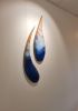 Namaka's Tears | Sculptures by Nadia Fairlamb Art | Treehouse Coworking in Honolulu. Item composed of birch wood and metal in minimalism or coastal style