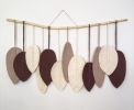 Macrame Wall Hanging with 12 Feathers | Wall Hangings by Damla. Item made of wood with cotton works with boho & country & farmhouse style