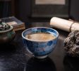 Heritage Wood-fired Porcelain Tea/Coffee Bowl Fish at Play | Decorative Bowl in Decorative Objects by Dynasty Artisan. Item composed of ceramic compatible with eclectic & maximalism and asian style