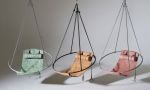 Modern Minimal Genuine African Leather Swing Chair | Easy Chair in Chairs by Studio Stirling. Item composed of steel & leather compatible with minimalism and coastal style