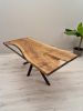 Epoxy dining table, epoxy resin table | Tables by Brave Wood. Item composed of walnut & metal