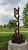 "Triangle Sentinels" | Public Sculptures by Brian Schader. Item made of steel with stone