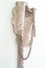 "Afra" Ceramic wall sculpture with chains | Wall Hangings by Asmaa Aman Studio. Item made of ceramic works with boho & contemporary style