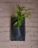 Hanging Slab-Dropped Planter | Vases & Vessels by Luke Shalan | Austin Proper Hotel in Austin. Item made of stoneware