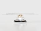 Pebble Dining Table Glass Top by Workshop Gaea | Tables by Gaea Craft. Item made of bronze with glass works with modern style