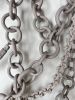 "Anissa" stoneware chain wall sculpture | Wall Hangings by Asmaa Aman Tran. Item composed of cotton & stoneware compatible with boho and contemporary style