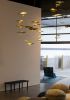 Nymphaea Installation | Lighting Design by Claudine Gevry Studio | Salari Fine Carpets in Vancouver. Item made of aluminum