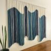 AURORA TEAL Blues Flowing Custom Textile Wall Hanging | Tapestry in Wall Hangings by Wallflowers Hanging Art. Item made of oak wood with wool works with mid century modern & contemporary style