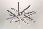 VORTEX chandelier | Chandeliers by Next Level Lighting | Kyiv Academic University in Київ. Item made of wood