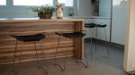 ¨Hug¨Kitchen Bar Stool Brass Steel & Tan Leather | Counter Stool in Chairs by Jover + Valls. Item composed of steel & leather
