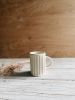 Ceramic Lined Mug in Oatmeal | Drinkware by Bridget Dorr. Item made of stoneware